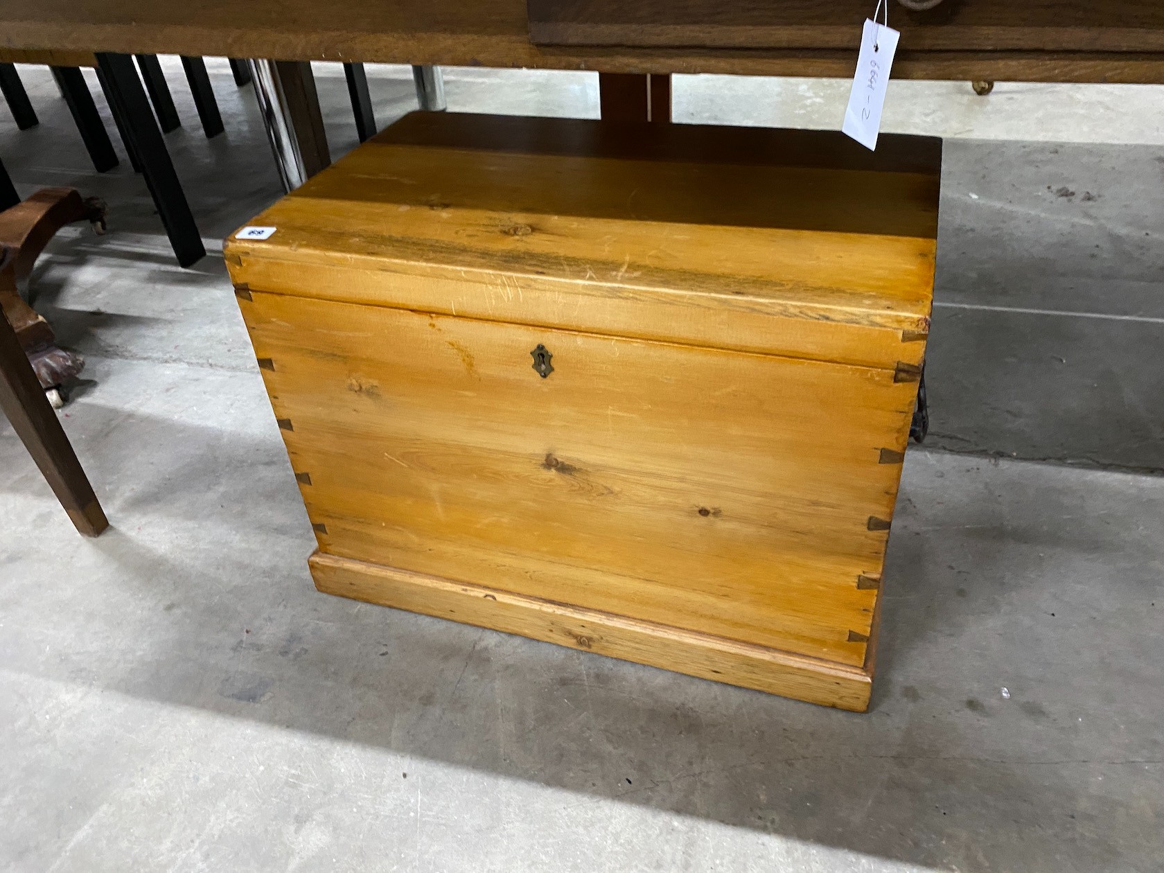 A Victorian style pine trunk with hinged top, width 61cm, depth 37cm, height 44cm